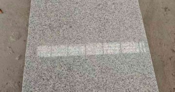 榆林芝麻白光面毛板